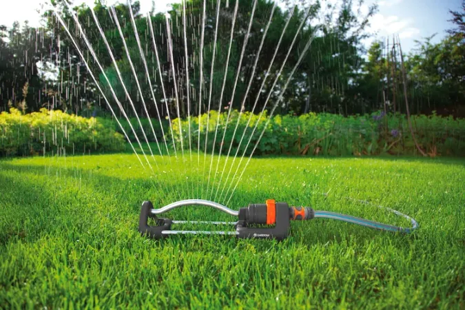 Oscillating sprinkler on lawn - Gen Lawn